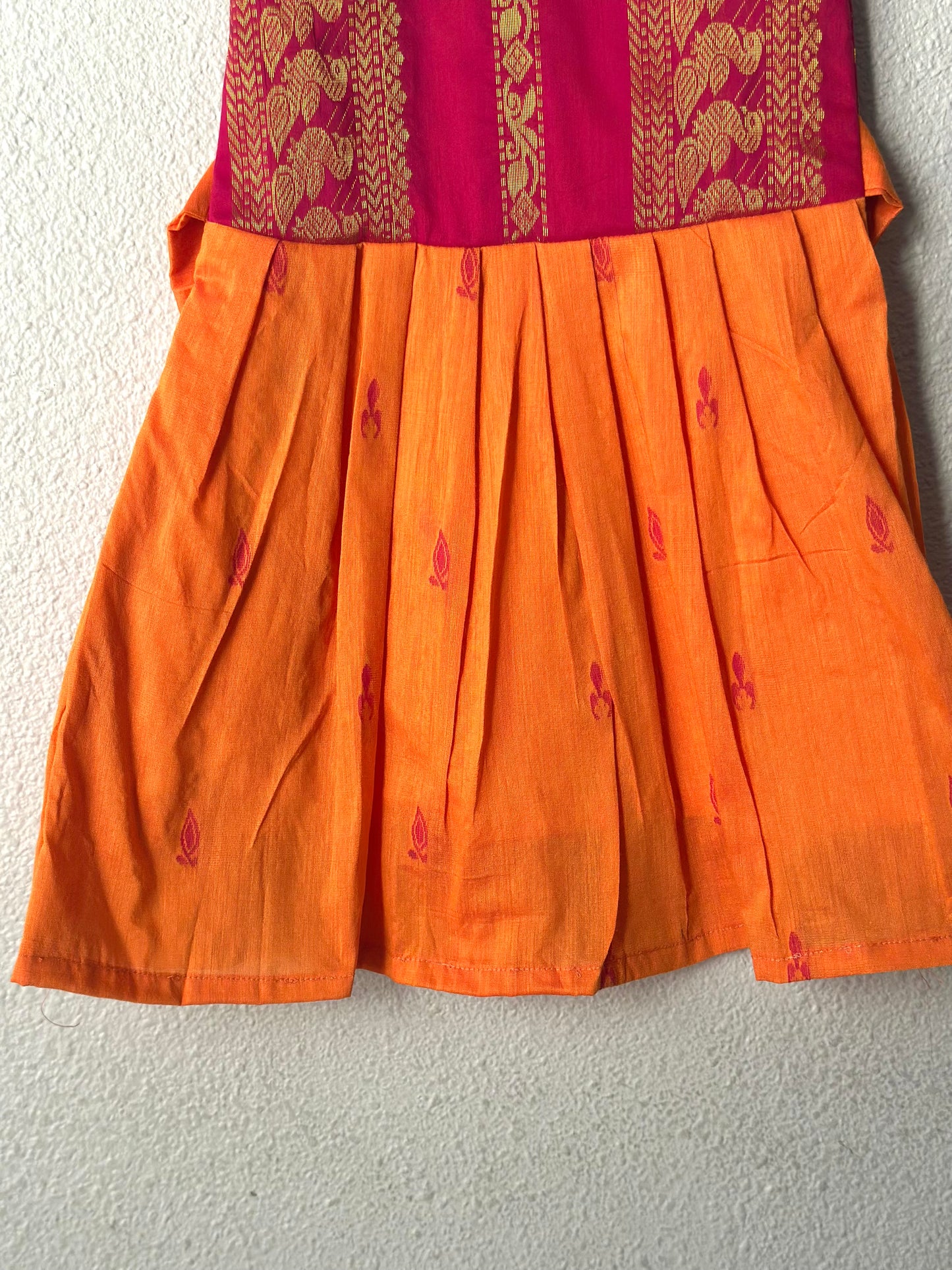 Orange and pink infant frock