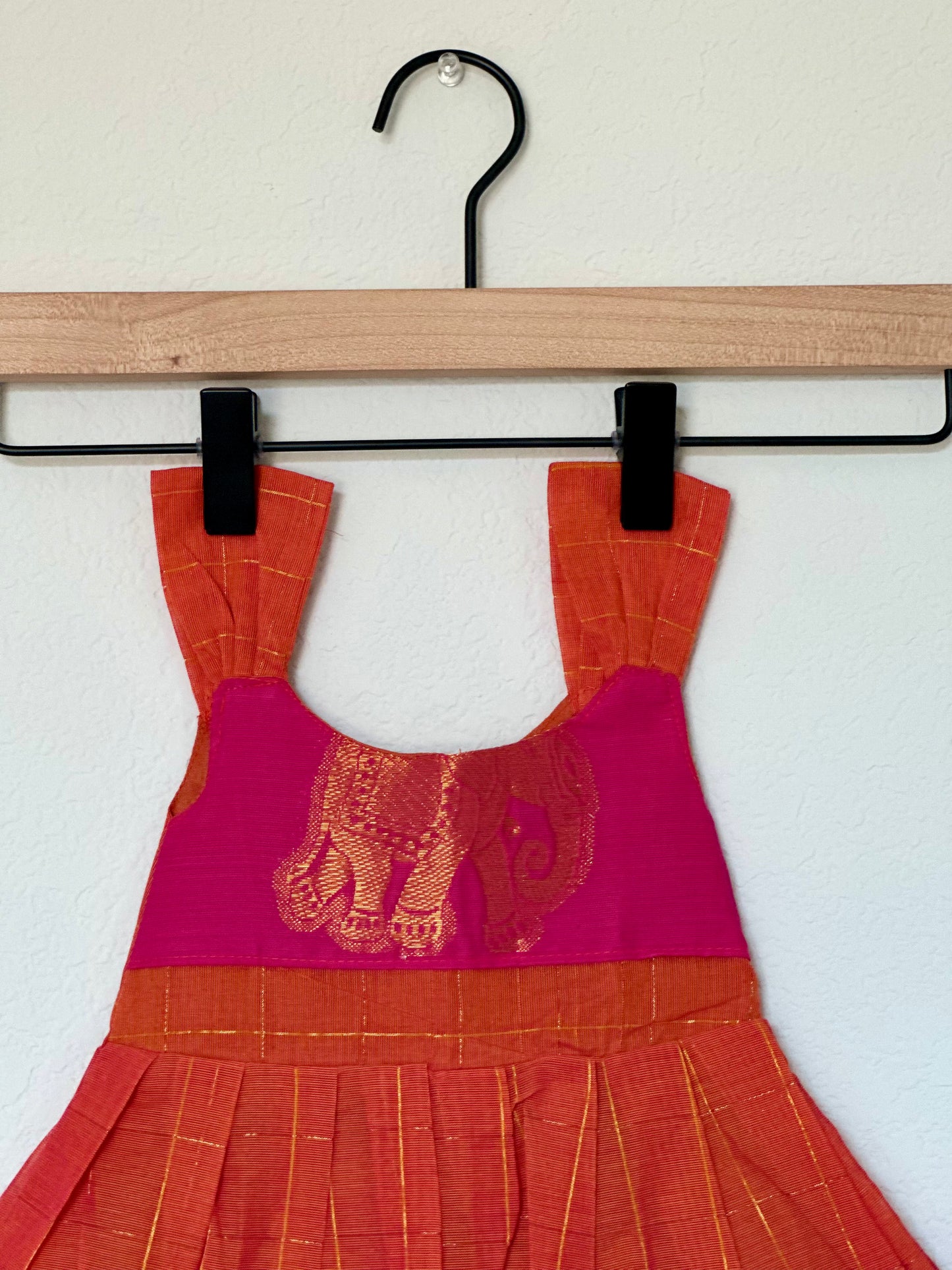Orange and pink Kanchi cotton infant frock