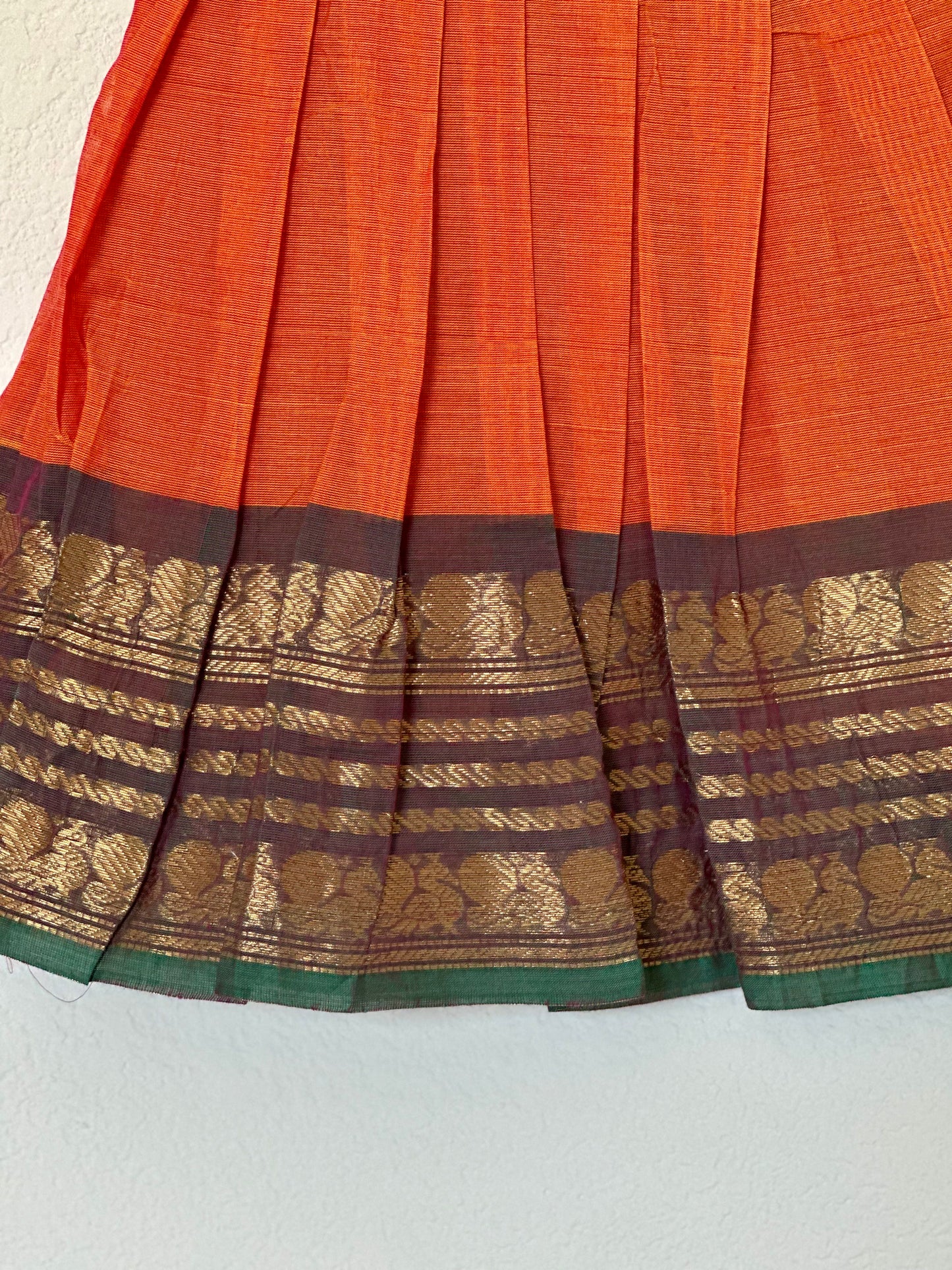 Orange and green Kanchi cotton infant frock