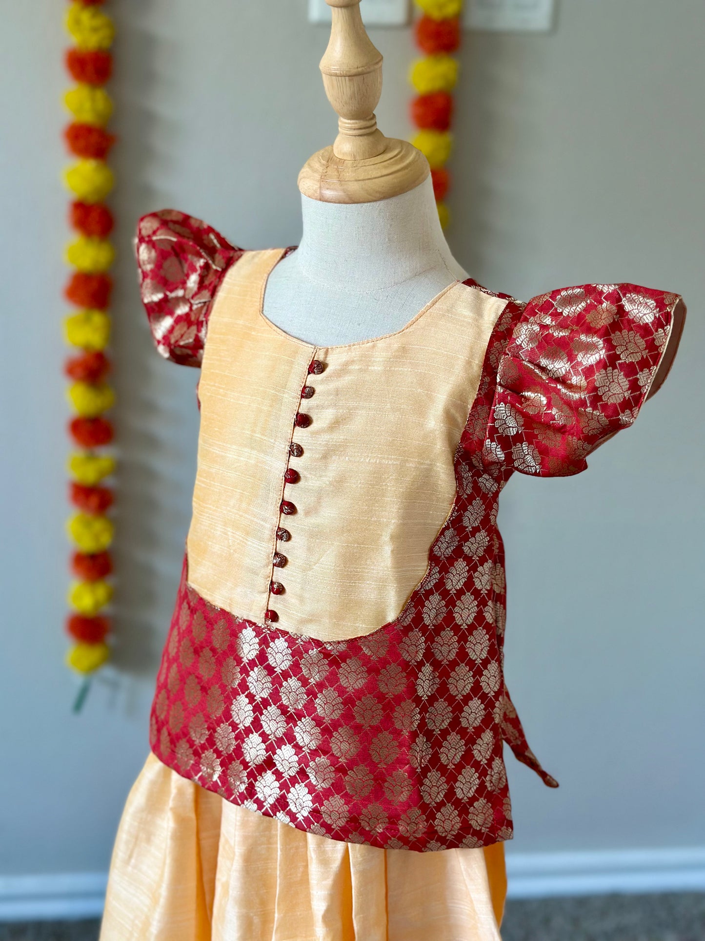 Beige and red kids skirt and top