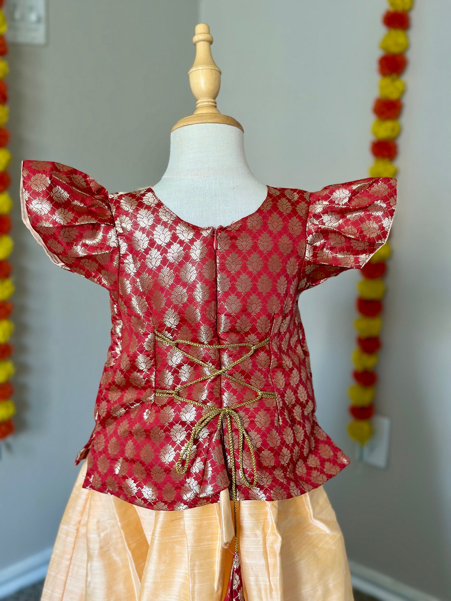 Beige and red kids skirt and top