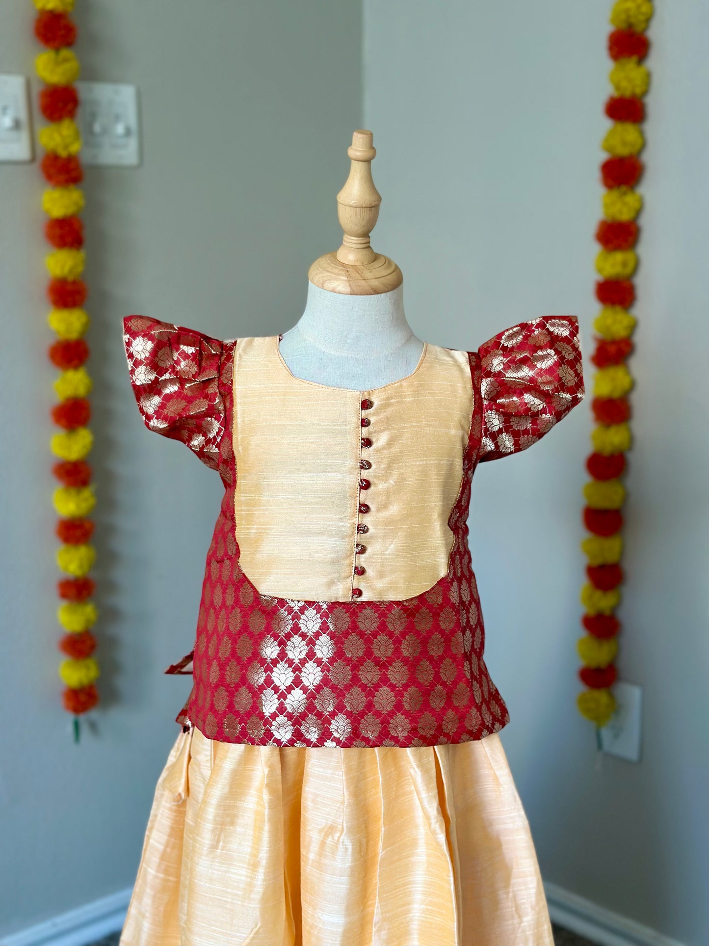 Beige and red kids skirt and top