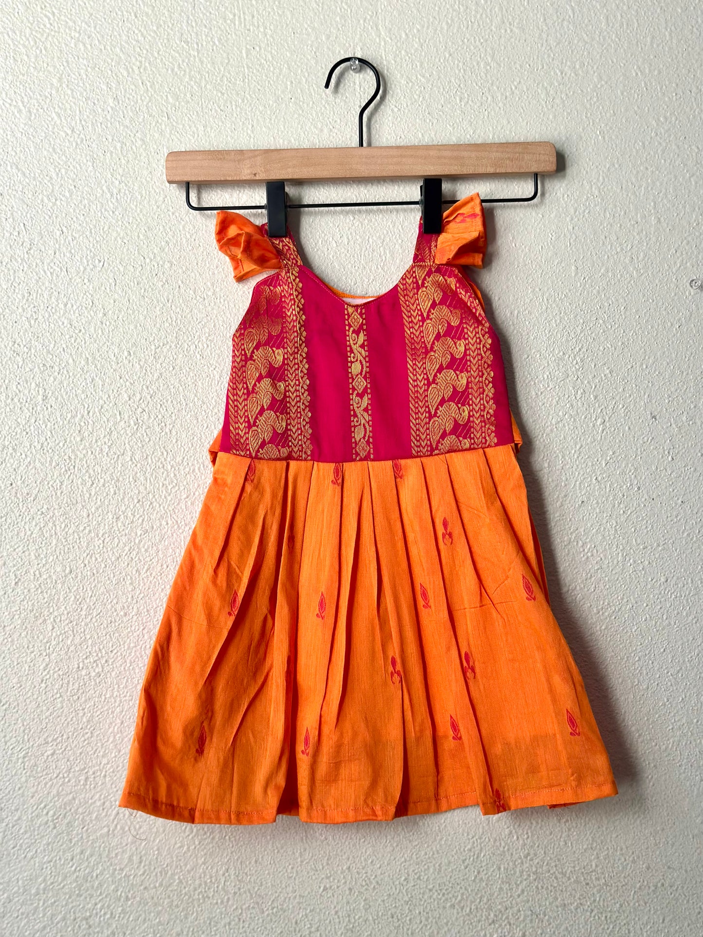 Orange and pink infant frock
