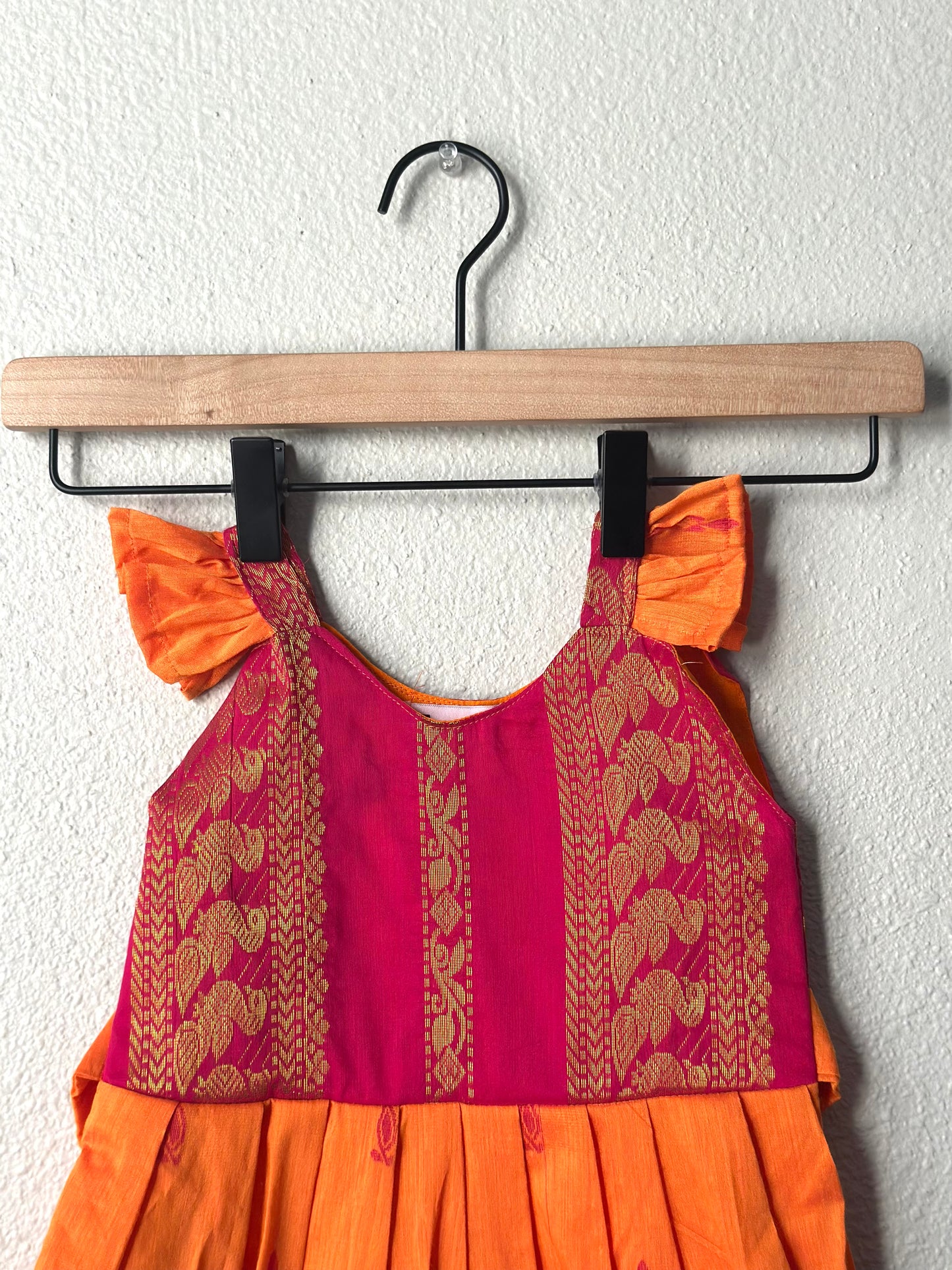 Orange and pink infant frock