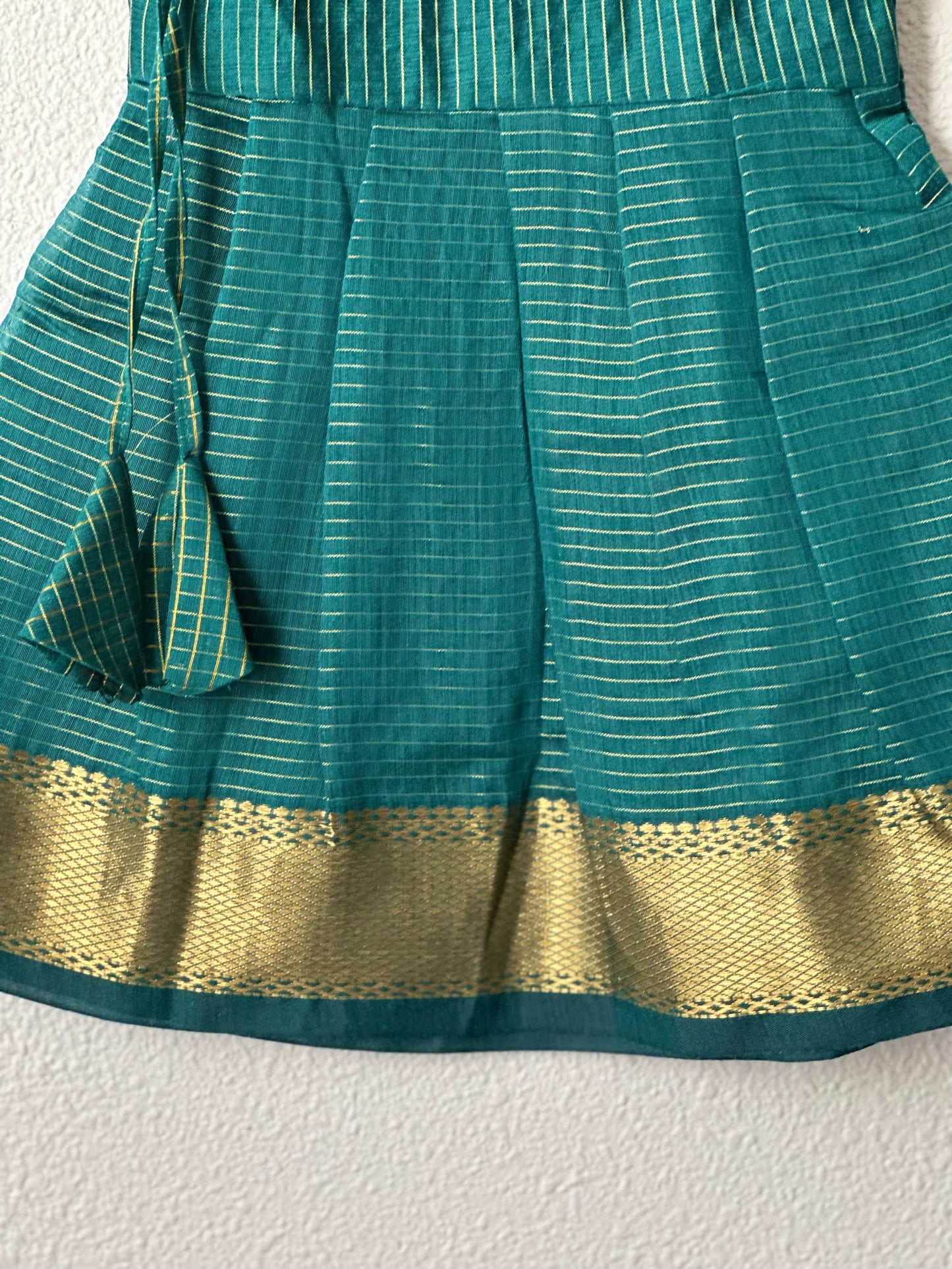 Green checks and gold tie up frock