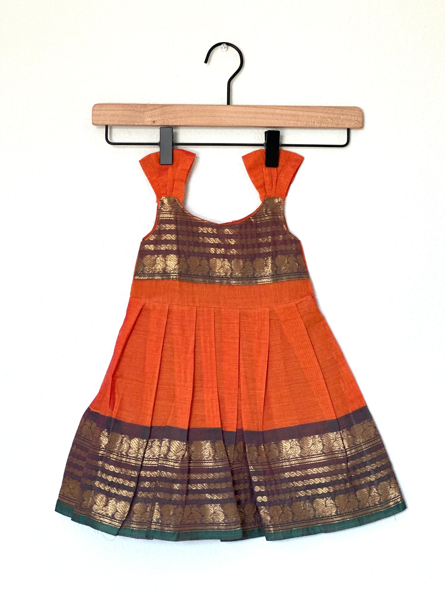 Orange and green Kanchi cotton infant frock