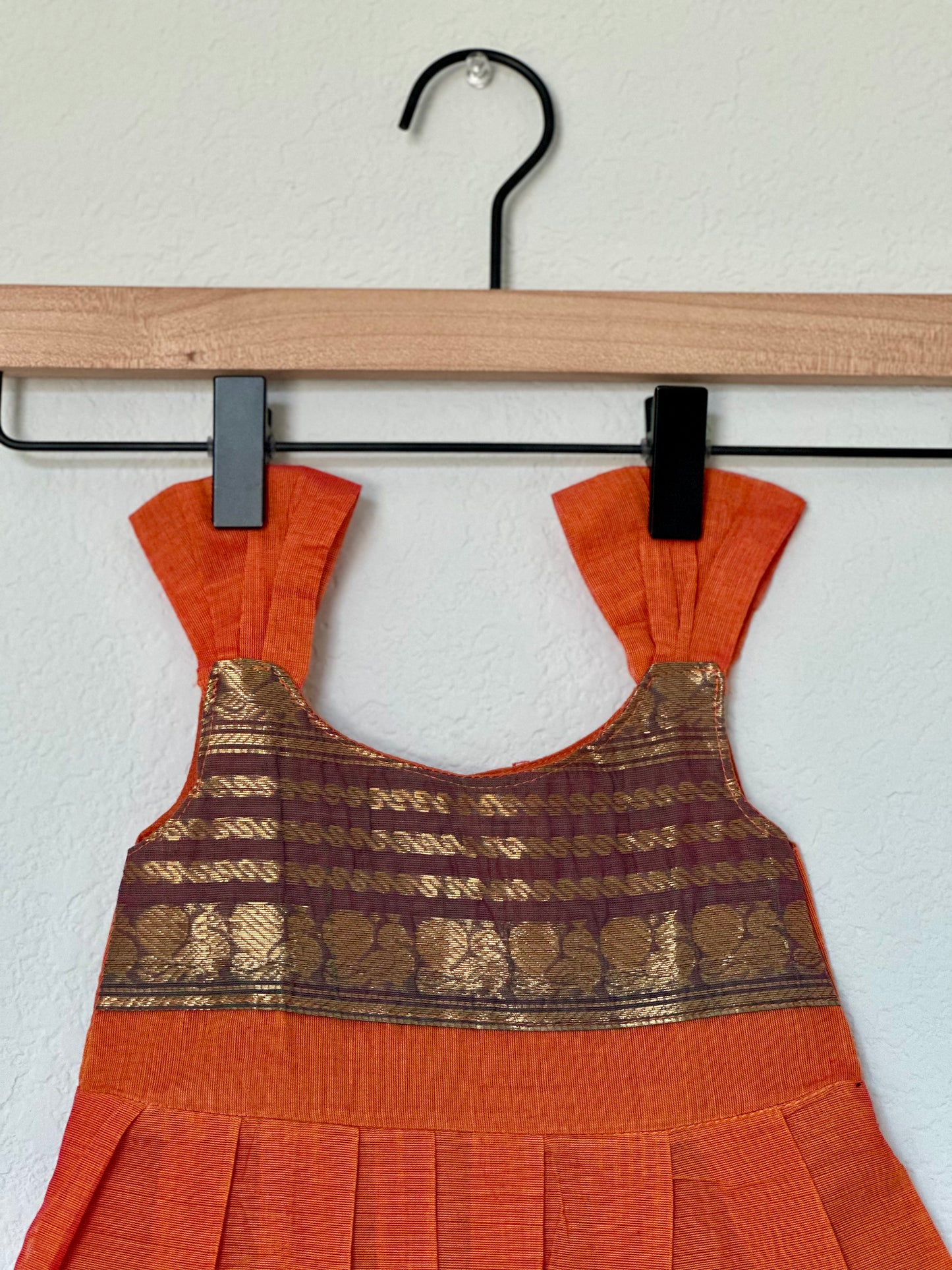 Orange and green Kanchi cotton infant frock